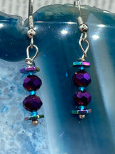 Load image into Gallery viewer, These rainbow hematite and dark purple glass beaded earrings are the ideal accessory for bohemian summer looks, providing a touch of chic elegance to hippie and nature-inspired styles. Measurements: 1” in length