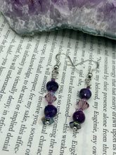 Load image into Gallery viewer, These stunning light and dark purple glass beaded earrings are the perfect accessory for summer ensembles and bohemian-inspired styles, offering a subtle yet stylish touch.  Measurements: 1 1/2” in length