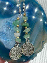 Load image into Gallery viewer, This nature-inspired set of earrings features a single strand of natural green aventurine chip stones and gold glass beads, highlighted by a silver-plated Tree of Life pendant. Measurements: 2 1/4” in length