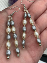 Load image into Gallery viewer, This piece is crafted with two strands of faux baroque pearls in white and gray, as well as silver glass beads. Measurements: 2” in length