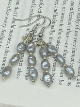 Load image into Gallery viewer, This earring set features two strands of gray faux baroque pearls and silver glass beads. Measurements: 1 1/2” in length