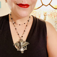 Load image into Gallery viewer, Dark Elegant Black, Gray, Silver Collar Style Adjustable Glass Beaded Necklace is the ultimate vampire goth jewelry statement piece to add to your jewelry collection. Metal raven skull with highly detailed bat wings. This beautiful necklace has a dark tone death raven theme, both is a unique and bold piece of jewelry. Necklace is 14 1/2” adjustable up to 18" in length - nickel free metal ravel skull pendant 2 3/4"