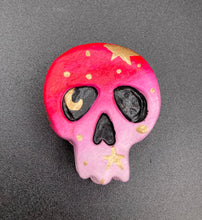 Load image into Gallery viewer, Cute and spooky magnet design to adorn your refrigerator, lockers, workstation, toolbox, or dishwasher. This statuette is exquisitely detailed and full of vivid colors, inspired by natural elements. The ombre effect from red to light pink replicates the hues of a summer sky at sundown, with added metallic gold moon and star silhouettes to complete the look. H 1 1/2” x W 1 1/2” x D 3/4”