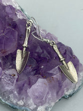 Load image into Gallery viewer, Gift the gardener in your life with these Garden Trowel Charm Earrings, a perfect piece of jewelry for garden lovers. The earrings feature a delicately crafted Trowel Tool Charm and are sure to make a statement. A memorable gift for any gardener!  Measurements: 1 1/2” in length