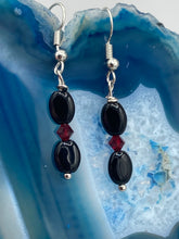 Load image into Gallery viewer, These delicate earrings feature beading of both black and dark red glass, perfectly harmonizing to make them a versatile accessory fit for a variety of looks, such as good witch, goth, and chic.  Measurements: 1 1/4” in length
