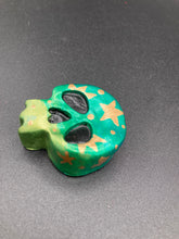 Load image into Gallery viewer, Ideal magnet design to adorn your refrigerator, lockers, workstation, toolbox, or dishwasher. Featuring intricate details and vibrant colors, this hand-painted skull statuette is inspired by nature. Its warm metallic green and gold hues recall the gorgeous tansy beetle, and the addition of moon and stars silhouettes creates a complete celestial motif.  H 1 1/2” x W 1 1/2” x D 3/4”
