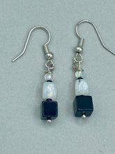 Load image into Gallery viewer, Featuring a large square-shaped black obsidian bead with iridescent glass accents, these earrings boast an intriguing, yet versatile aesthetic. Measurements: 1” in length