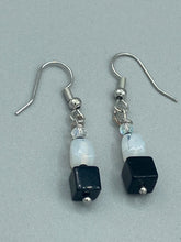 Load image into Gallery viewer, Featuring a large square-shaped black obsidian bead with iridescent glass accents, these earrings boast an intriguing, yet versatile aesthetic. Measurements: 1” in length