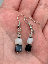 Load image into Gallery viewer, Featuring a large square-shaped black obsidian bead with iridescent glass accents, these earrings boast an intriguing, yet versatile aesthetic. Measurements: 1” in length