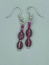 Load image into Gallery viewer, These delicate earrings feature light purple and tiny fuchsia glass beads, which offer a range of beautiful hues, such as blue, green, pink and gold. With a versatile style, these earrings will enhance any ensemble. Measurements: 1 1/2” in length