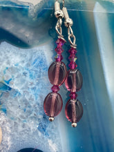 Load image into Gallery viewer, These delicate earrings feature light purple and tiny fuchsia glass beads, which offer a range of beautiful hues, such as blue, green, pink and gold. With a versatile style, these earrings will enhance any ensemble. Measurements: 1 1/2” in length