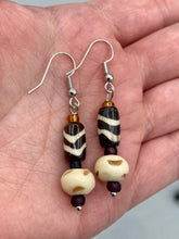 Load image into Gallery viewer, Featuring a classic wavy line design, these earring sets come in a neutral color palette, making them suitable for a wide range of occasions. Creatively crafted from both cylinder and round bone beads, they offer a distinct, eye-catching look that will surely make your ensemble stand out.  Measurements: 1 1/2 ” in length