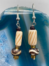 Load image into Gallery viewer, This earring set features cylinder and round bone beads with decorative wavy lines and dot designs, as well as gold-tone glass beads. Neutral colors make these earrings perfect for any occasion - dress them up or down for a look that is sure to be one-of-a-kind.  Measurements: 1 5/8 ” in length