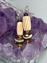 Load image into Gallery viewer, This earring set features cylinder and round bone beads with decorative wavy lines and dot designs, as well as gold-tone glass beads. Neutral colors make these earrings perfect for any occasion - dress them up or down for a look that is sure to be one-of-a-kind.  Measurements: 1 5/8 ” in length