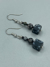Load image into Gallery viewer, These Square Shape Snowflake Obsidian Beaded Earrings are perfect for achieving a boho chic and nature-inspired look. Featuring a cool tone stone set of beads, these earrings are large and perfectly versatile for a range of styles. Measurements: 1 1/4” in length