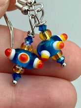Load image into Gallery viewer, Vibrant color bumpy round lampworked glass bead set of earrings. Colorful teal, white, yellow, and bright orange festive piñata shaped bead.  This also reminds me of the shape of a virus. Either way, this is a super fun, unique, bold piece of jewelry, it's sure to make a statement piece.  Measurements: 1” in length