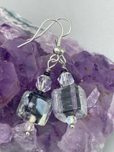 Load image into Gallery viewer, This striking set of earrings features large square-shaped clear glass beads adorned with black-and-white designs. Neutral-hued stone beads lend a cool feel, making them both unique and versatile. Measurements: 1 1/4” in length