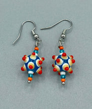Load image into Gallery viewer, Vibrant color bumpy round lampworked glass bead set of earrings. Colorful teal, white, yellow, and bright orange festive piñata shaped bead.  This also reminds me of the shape of a virus. Either way, this is a super fun, unique, bold piece of jewelry, it's sure to make a statement piece.  Measurements: 1 1/4” in length