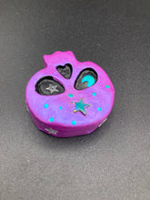 Load image into Gallery viewer, Inspired by nature, this skull statuette is full of shimmery metallic, and vibrant colors and intricate details. The metallic violet color reminds me of sundown, when the sky is illuminating from blue to purple to black. I painted a moon and stars with a teal/green paint to really create a beautiful contrast against the violet color. The forehead of the skully has a beautiful rainbow hematite star bead.