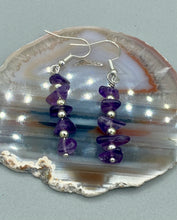 Load image into Gallery viewer, This single strand of beads is composed of natural amethyst stone chips and silver glass beads for a unique, bohemian look. Measurements: 1 1/2 ” in length