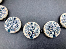 Load image into Gallery viewer, This eye-catching, sizable and conspicuous black stone beads create a powerful accent piece. Crafted of reconstituted quartzite lentil beads in a tree pattern, these beads measure approximately 24mm. To enhance their effect, a round necklace of black glass beads is included. Perfect for casual or formal wear, this necklace adds an elegant finish to any ensemble. Matching earrings feature white rose reconstituted quartzite beads, completing the set. Measurements: Necklace is 18 " in length