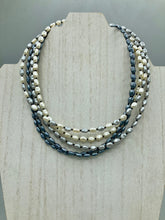 Load image into Gallery viewer, This necklace boasts five strands of varying shades of white and gray faux baroque pearls, as well as a selection of black glass beads. Measurements: Necklace is 16 1/2" in length and can be adjusted to 18"
