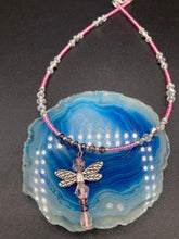 Load image into Gallery viewer, This softy pink and purple choker style necklace with a silver dragonfly pendant is perfect for nature lovers. Glass beads make the necklace adjustable, and it comes with matching dragonfly earrings for a truly magical, fairy princess look. An ideal accessory for summer. Measurements: Necklace is 15 1/2” adjustable up to 18"