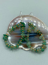 Load image into Gallery viewer, Elegant hoop earrings featuring natural green aventurine stone chips and gold-tinged glass beads. Measurements: 2" length and 1 1/2” in width
