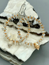 Load image into Gallery viewer, Natural white moon stone chip with white and gold glass beaded hoop earrings with super tiny natural conch shells. Nature lovers, beach vibes, summer earring will compliment any look. Measurements: 2" length