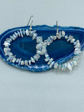 Load image into Gallery viewer, These nature-inspired White Moon Stone Chip Beaded Hoop Earrings are the perfect accessory for adding a boho-chic vibe to any look. Crafted with natural white moon stone chips and blue glass beads, these earrings will complete your outfit with the ultimate hippie and shabby-chic feel. Measurements: 1 1/2" length