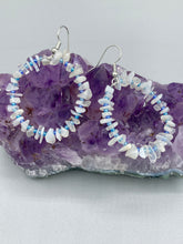 Load image into Gallery viewer, These nature-inspired White Moon Stone Chip Beaded Hoop Earrings are the perfect accessory for adding a boho-chic vibe to any look. Crafted with natural white moon stone chips and blue glass beads, these earrings will complete your outfit with the ultimate hippie and shabby-chic feel. Measurements: 1 1/2" length