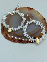 Load image into Gallery viewer, Crafted with natural white moonstone chips, blue glass beads and tiny conch shells, these hoop earrings are a bohemian statement piece. Perfect for nature and beach lovers, they add a touch of shabby chic to any summer look. Measurements: 2" length