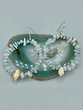 Load image into Gallery viewer, Crafted with natural white moonstone chips, blue glass beads and tiny conch shells, these hoop earrings are a bohemian statement piece. Perfect for nature and beach lovers, they add a touch of shabby chic to any summer look. Measurements: 2" length