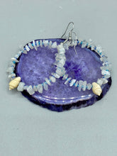 Load image into Gallery viewer, Crafted with natural white moonstone chips, blue glass beads and tiny conch shells, these hoop earrings are a bohemian statement piece. Perfect for nature and beach lovers, they add a touch of shabby chic to any summer look. Measurements: 2" length