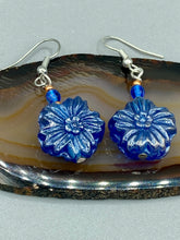 Load image into Gallery viewer, This Dark Blue Violet Floral Pressed Glass Beaded Earrings feature a captivating iridescent shimmer finish that adds beautiful detail. Measurements: 1 1/4" length