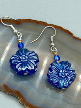 Load image into Gallery viewer, This Dark Blue Violet Floral Pressed Glass Beaded Earrings feature a captivating iridescent shimmer finish that adds beautiful detail. Measurements: 1 1/4" length