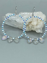 Load image into Gallery viewer, These Pressed Glass Leaf Beaded Hoop Earrings are perfect for a shabby chic, bohemian, or hippie vibe. The iridescent glass beads give off a soft and glamorous sparkle, while the clear glass charms have a shimmer finish with hints of gold, purple, blue and pink. They are the perfect nature-inspired accessory. Measurements: 2" length