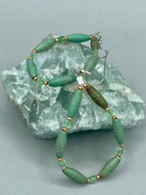 Load image into Gallery viewer, Crafted with exquisite detail, these Forest Green Magnesite Stone and Light Green and Gold Glass Beaded Fish Hook Earrings are perfect for any Hippie Vibe, Shabby Chic, Boho Chic, Nature Inspired, or Bohemian look. Measurements: 2 1/2" length