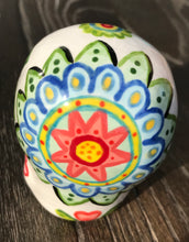 Load image into Gallery viewer, Bring Southwest beauty to any space with this unique ceramic sugar skull art. Hand-painted with bright colors, this piece captures the spirit of Sedona in a Dia de Los Muertos ofrenda. Let this delightful piece evoke the magical beauty of the amazing landscape you'll never forget. H 2 3/4” x W 2” x D 2”