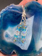 Load image into Gallery viewer, Dainty iridescent and light blue round glass beads fish hook style earrings 1"