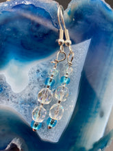 Load image into Gallery viewer, Dainty Iridescent and light blue road glass beads with fish hook style earrings 1"
