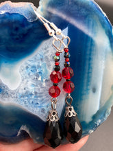 Load image into Gallery viewer, Red and black round glass beads with large teardrop black bead fish hook style earrings 2"