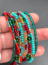 Load image into Gallery viewer, Vibrant And Enchanting Southwest Style Jewelry. This stunningly bold statement piece contains nine beaded strands full of variant turquoise, bright and dark reds and greens, golds and yellows. I created this beautiful jewelry piece by using a wide variety of different bead shapes from large and small round, round tubes, and squares. Measurements: 7 1/2" in length