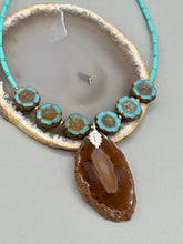 Load image into Gallery viewer, This exquisite Natural Dark Brown Agate Geode Sliced Stone Chip Necklace adds a unique touch of luxury to any look. Its banded geode and hibiscus flower glass beads offer a sophisticated bohemian style, and the natural gemstones are sure to make a statement. Add it to any outfit for a stylish and timeless touch. Measurements:     Necklace is 18” in length - pendant is 1 3/4” Height    Amber Stone Chip Earrings: 2&quot; in length  
