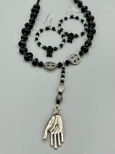 Load image into Gallery viewer, This sophisticated pair of earrings features a black glass fish bead, complemented by small iridescent and dark gray color glass beads, with eye and fin details.  Measurements: 2” in length    
