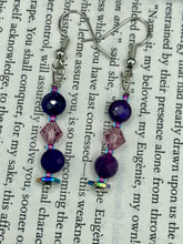 Load image into Gallery viewer, These stunning light and dark purple glass beaded earrings are the perfect accessory for summer ensembles and bohemian-inspired styles, offering a subtle yet stylish touch.  Measurements: 1 1/2” in length
