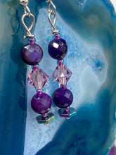 Load image into Gallery viewer, These stunning light and dark purple glass beaded earrings are the perfect accessory for summer ensembles and bohemian-inspired styles, offering a subtle yet stylish touch.  Measurements: 1 1/2” in length
