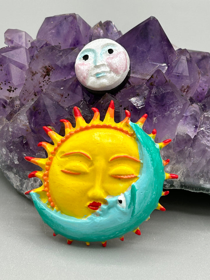 Mexican folk art hand-crafted sun and moon art magnets.