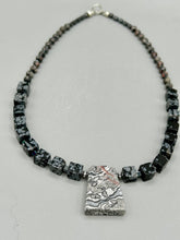 Load image into Gallery viewer, This rustic necklace features an eye-catching large trapezoid-shaped Picasso jasper, hematite, square-shaped snowflake obsidian combo set in a unique and chic design. Handcrafted from genuine stones, this necklace is perfect for any bohemian look.   Measurements:  Necklace is 21&quot;
