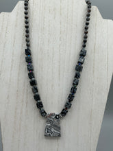 Load image into Gallery viewer, This rustic necklace features an eye-catching large trapezoid-shaped Picasso jasper, hematite, square-shaped snowflake obsidian combo set in a unique and chic design. Handcrafted from genuine stones, this necklace is perfect for any bohemian look.   Measurements:  Necklace is 21&quot;

